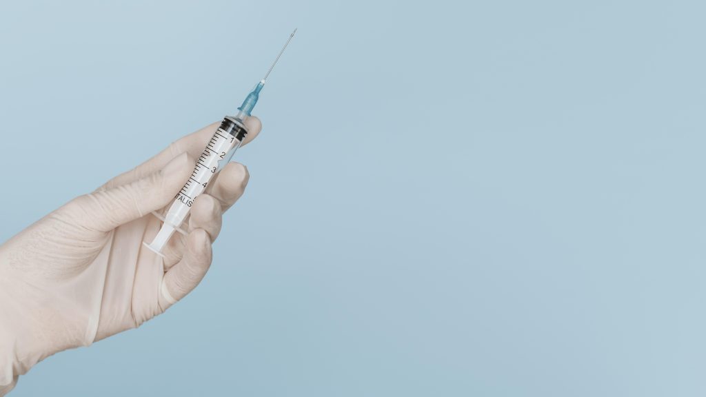 Shoulder Pain: Treatments, Symptoms And Causes 7 Hand With Glove Copy Space Holding Syringe | Avant Orthopaedics
